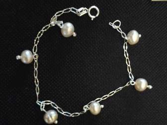 pulsera de plata con perlas